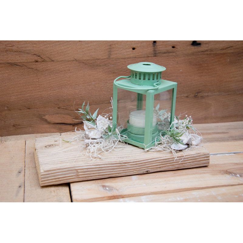 Kleine Laterne auf Schwemmholz