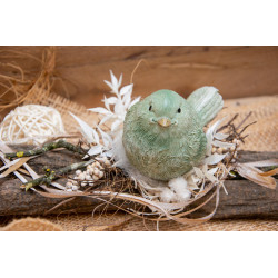 Vogel auf Holzstücke
