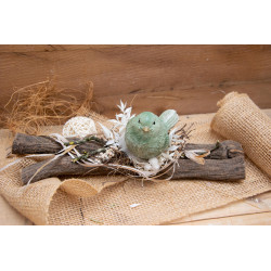 Vogel auf Holzstücke