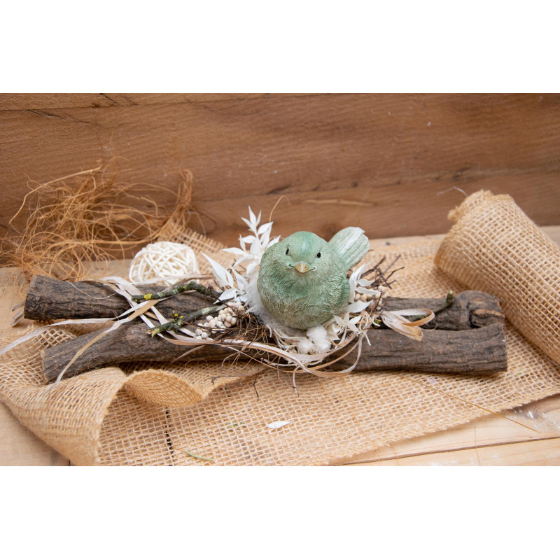 Vogel auf Holzstücke